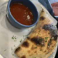 Calzone · Add toppings for an additional charge.