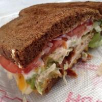 Chicken & Bacon Ranch Sandwich · Our classic chicken with melting cheddar cheese topped with bacon, lettuce tomato onions and...