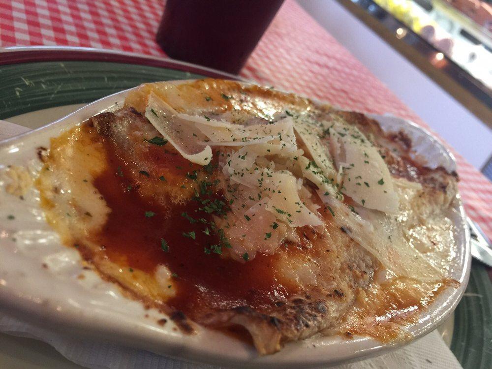 Crepes · Crespelle al' forno. Homemade crepes filled with ricotta and spinach baked in a special sauce.