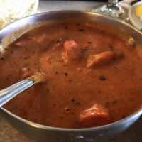 Chicken Tikka Masala · Boneless tandoori chicken cooked in a special tomato butter sauce.
