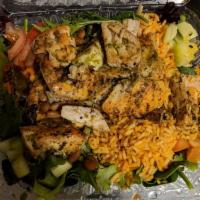 Seafood Salad · Baby mixed greens, rice, pinto beans, Roma tomatoes, cucumber, carrots and sesame cilantro v...