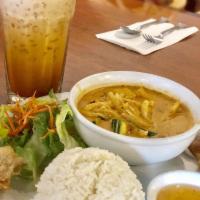 Red Curry · Choice of protein. Homemade red curry paste in coconut milk with zucchini, bamboo shoots, ba...