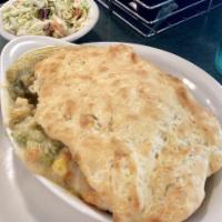 Chicken Pot Pie · Tender chicken, carrots, celery and corn in
our velvety cream sauce and topped with
our orig...