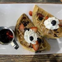 Berry Bo Berry · Traditional waffle, blackberries, strawberries, raspberries, blueberries, topped with whippe...