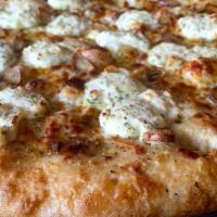 White Pizza · Garlic butter, mozzarella cheese, ricotta cheese, roasted garlic, Tuscan extra virgin olive ...
