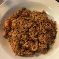Creole Jambalaya Dinner · Andouille sausage, crawfish, smoked turkey, Tasso ham, shrimp sautéed in a spicy Creole toma...
