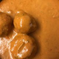 Malai Kofta · Homemade cheese stuffed in vegetable balls, cooked in mildly spiced cream sauce. Served with...