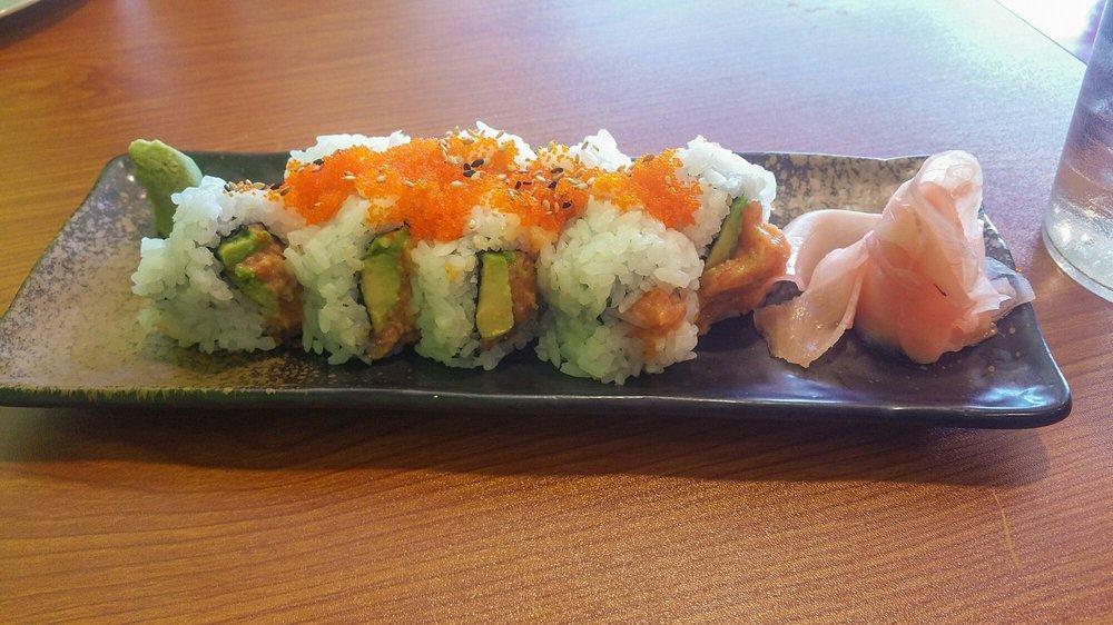 Spicy Tuna Roll · Spicy tuna with cucumber inside and fish eggs on top.