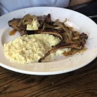 Garlic Rosemary Lamb Chops · Lamb chops grilled to order, served with zip sauce, buttermilk whipped potatoes and chef's s...