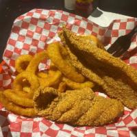 Uncle Charles' Cajun Fried Catfish Basket · Includes fries and Texas toast with homemade tartar sauce.