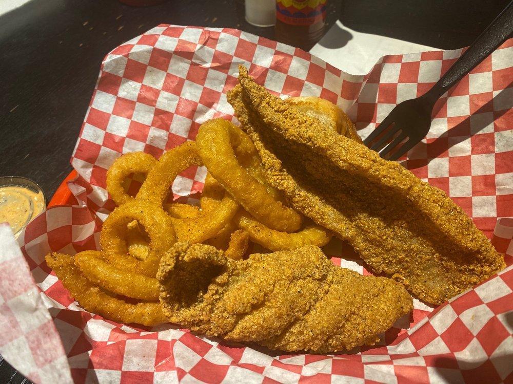 Uncle Charles' Cajun Fried Catfish Basket · Includes fries and Texas toast with homemade tartar sauce.
