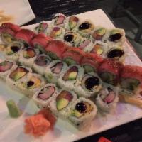 Fireman Roll · White tuna tempura, avocado, spicy mayo and jalapeno inside topped with seared black pepper ...