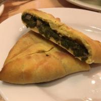 Spinach Pie · Filled with spinach, onions and a touch of lemon. Vegan, contains soy.