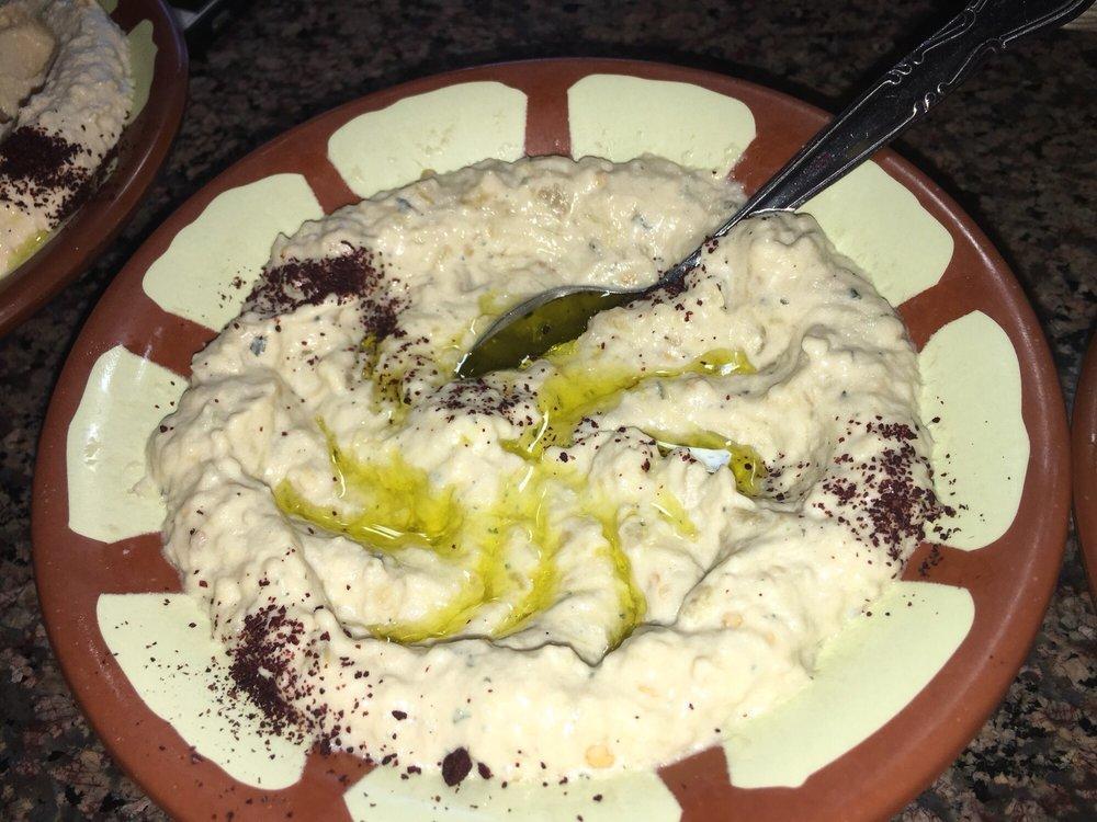 Baba Ghanoush · Roasted eggplant with lemon and tahini sauce.