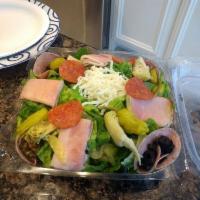 Antipasto Salad · Crisp romaine hearts with Genoa salami, mozzarella, provolone, hot coppa ham, sauteed, mushr...