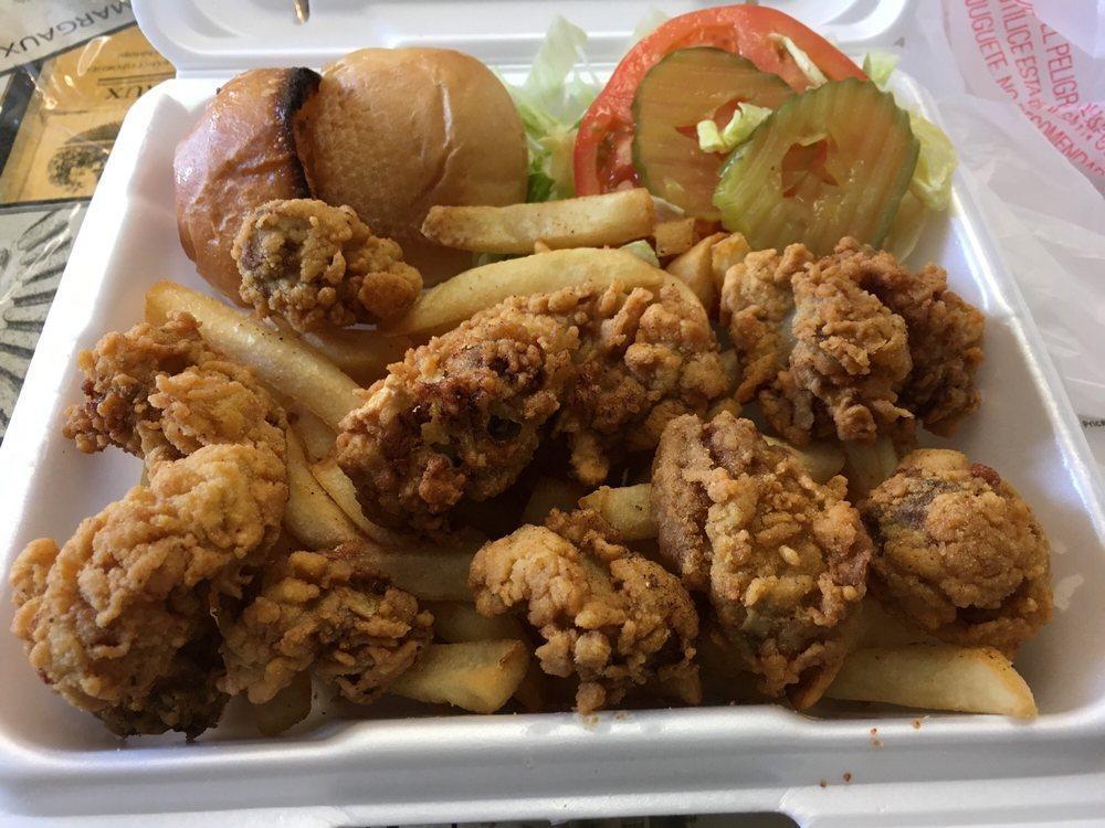 Fried Oyster Platter · Served with choice of Cajun fries, regular fries or shrimp fried rice. Includes your choice of coleslaw, potato salad or green salad. Served with toasted bread, cocktail sauce and tartar sauce.