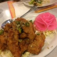 Salt and Pepper Pork Chops · House marinated pork. Served with white rice. Spicy.