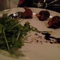 Bacon Wrapped Figs · Black Mission figs, Gorgonzola, bacon, balsamic reduction, honey.