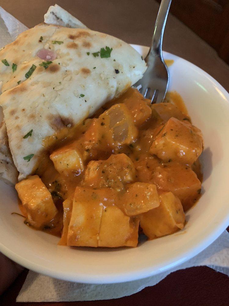 Paneer Tikka Masala · Cottage cheese cubes with crispy bell peppers and onions in a creamy tomato based sauce.