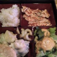 Chicken Teriyaki · Served with white rice and steamed Asian vegetable on hot plate. Comes with soup and salad.