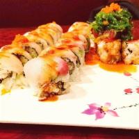 Christmas Tree Roll · Spicy tuna roll in the bottom, tuna tataki in the middle and seaweed salad on top. Hot and s...