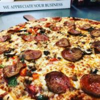 Korner's Classic Pizza · Sundried tomatoes, onions, green peppers, mushrooms, sausage, pepperoni and gourmet cheese.