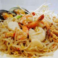 Pad Thai · Thin rice noodles stir-fried with bean curd, crushed peanuts, bean sprouts, scallions and egg.