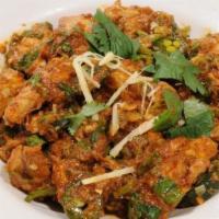 Lahori Chicken Karahi Boneless · Boneless chicken is cooked in a tomato based sauce and spices, flavoured with ginger and gar...