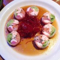 Summer Roll · Inside: tuna, salmon, snapper, crabstick, shrimp, crabmeat, cilantro and lettuce. Outside: r...