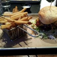 Hickory Burger · Certified Hereford beef hand-pattied in-house, and served on a baked bun with cheddar, thick...