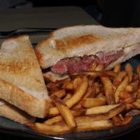 Grilled Ribeye Sandwich · Choice ribeye seasoned and grilled and served on our sourdough bread with fontinella cheese ...