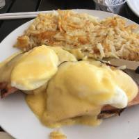 Eggs Benedict · 2 poached eggs and ham on a toasted English muffin, topped with hollandaise sauce.