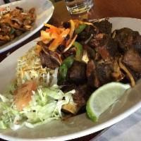 Roasted Goat Cutlet · A traditional somali dish featuring roasted goat, infused with authentic spices and herbs se...