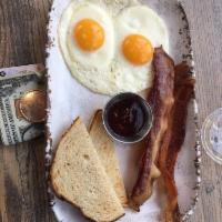 Classic Breakfast · 2 farm eggs, toast and your choice of meat or greens