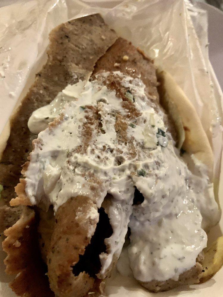 Chicken Gyro · Grilled chicken seasoned with our special Mediterranean spices and topped with tzatziki sauce and wrapped in a soft, warm pita.