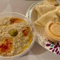Baba Ghanouj · A textured mix of smokey, roasted eggplant, tahini, lemon, and fresh garlic, with olive oil,...
