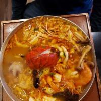 Seafood Lobster Hot Soup · Napa lobster, soft tofu, vermicelli, enoki mushroom, seaweed knot, brown beech mushroom, zuc...