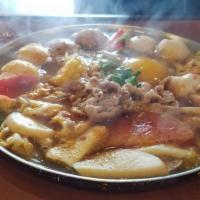 Curry Flavor Hot Soup · Napa pork slice, vermicelli, tomato, corn, egg, enoki mushroom, imitation crab meat, kamabok...