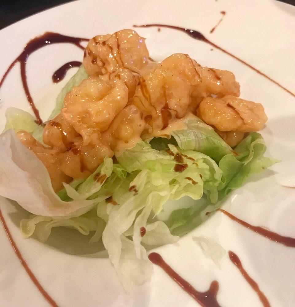 Rock Shrimp · Tempura shrimp in chef's special sauce.