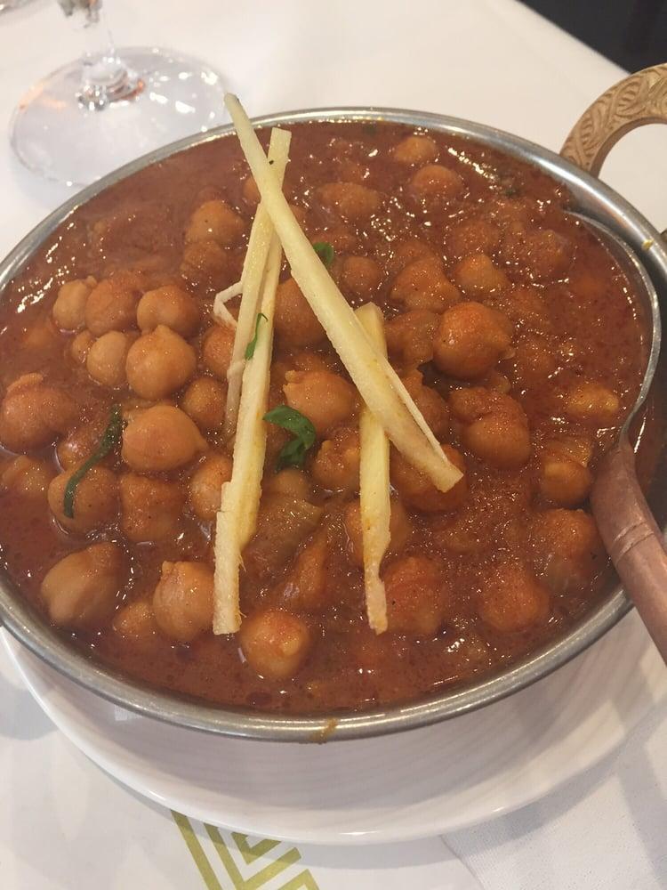 Chana Masala · Chickpeas cooked with potatoes, spices and herbs. Served with basmati rice.