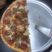 Meat Lover Pizza · Pepperoni, ham, sausage, bacon and meatballs.