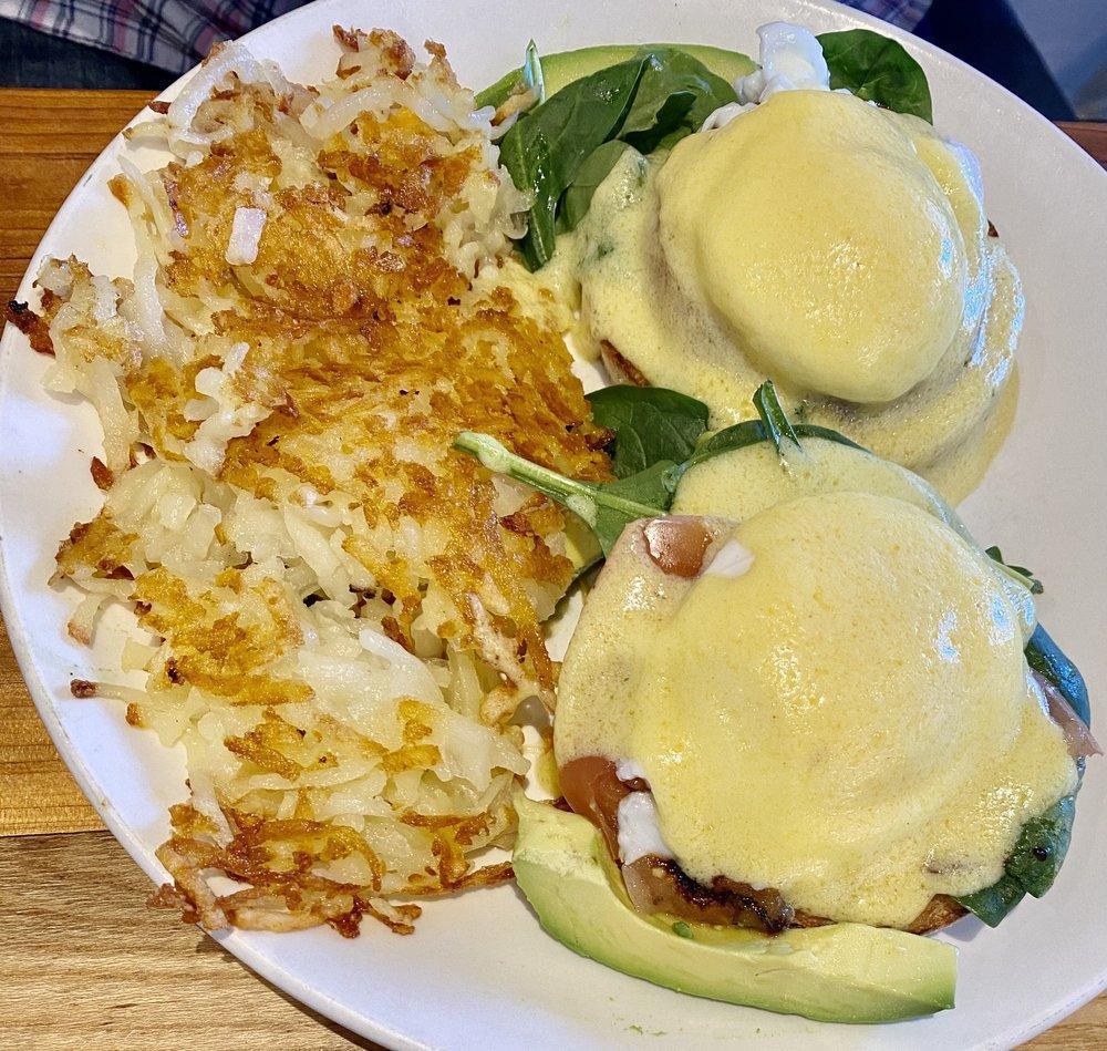 Starwood Benedict · 2 poached eggs with fresh spinach, griddled tomato, and avocado on a toasted English muffin, topped with our hollandaise sauce. Served with your choice of side.