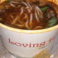 Spicy Royal Noodle · Lemongrass-based soup of rice noodle with tofu, vegan protein, mushroom, cabbage and fresh h...