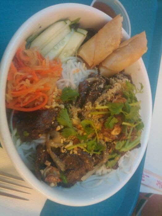 Vermicelli Delicacy · Rice noodles with fresh mint and vegetables, topped off with a spring roll and stir-fried vegan protein.