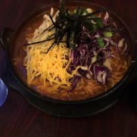 Kimchi Ramen · Spicy kimchi flavored broth with egg noodle ramen. Choice of pork or tofu.