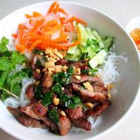 Vietnamese BBQ Pork & Rice Noodle · Vietnamese cold rice vermicelli noodle dish topped with marinated grilled pork, fresh basil ...