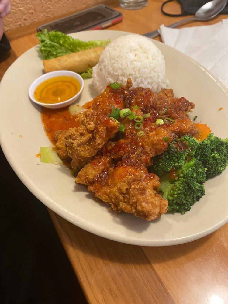 Volcano Chicken · Lightly batter fried chicken sauteed in sweet and hot chili sauce served on the bed of steamed vegetable. Spicy.