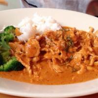 Panang Curry · Panang curry paste in coconut milk cooked with green bean and bell pepper.