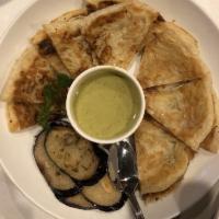 Green Curry Roti · Indian bread, served with green curry and eggplant.