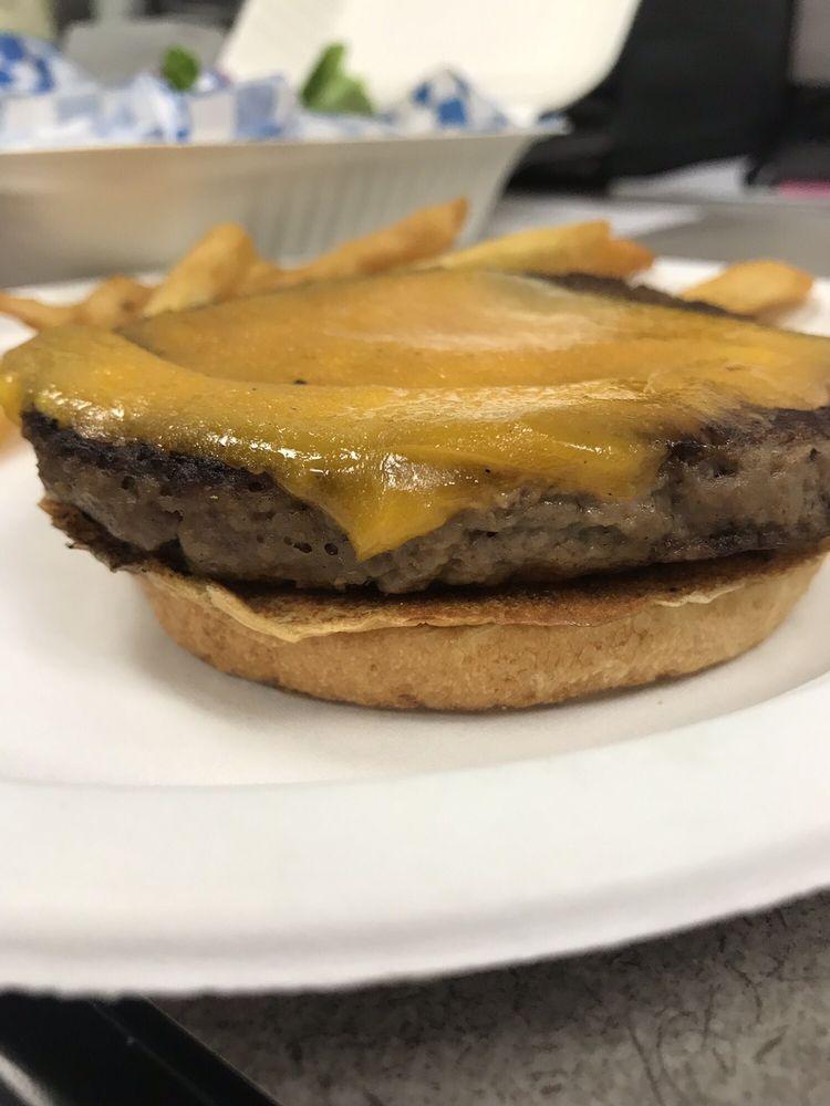 Impossible Burger · 1/4 pound impossible patty, cheddar cheese, ketchup, mustard, mayo, red onion and pickle chips.